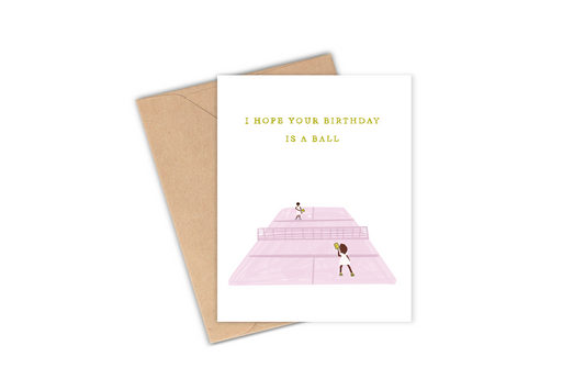 This greeting card features a drawing of a couple of cuties playing a game of pickleball with the phrase "I hope your birthday is a ball". Perfect for your friend who loves to play pickleball every chance they get - this card is sure to give them a laugh!