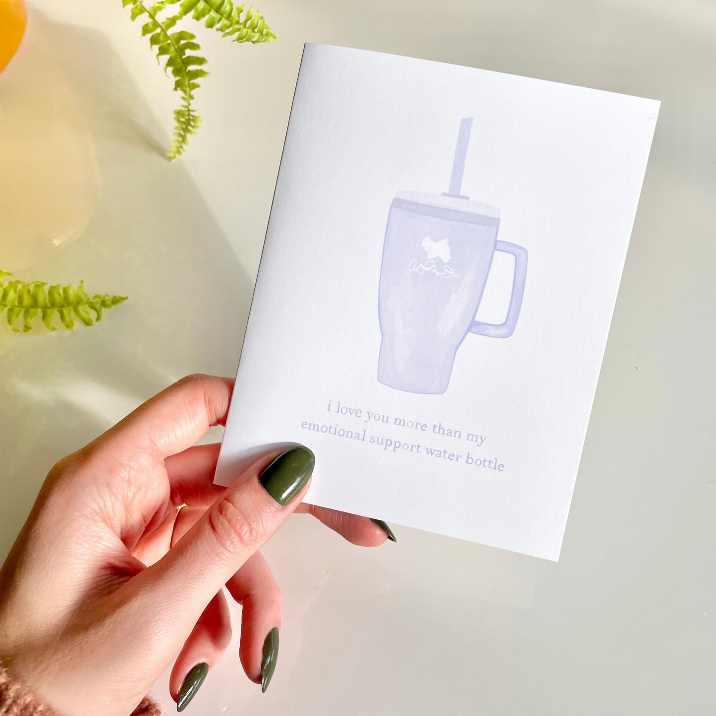 You know that one friend who doesn't go ANYWHERE without her water bottle? Well, we found the perfect card for her. Its features a hand-drawn image of a water bottle and the phrase "I love you more than my emotional support water bottle". This card pairs best with a brand new emotional support water bottle, because you can never have too many!