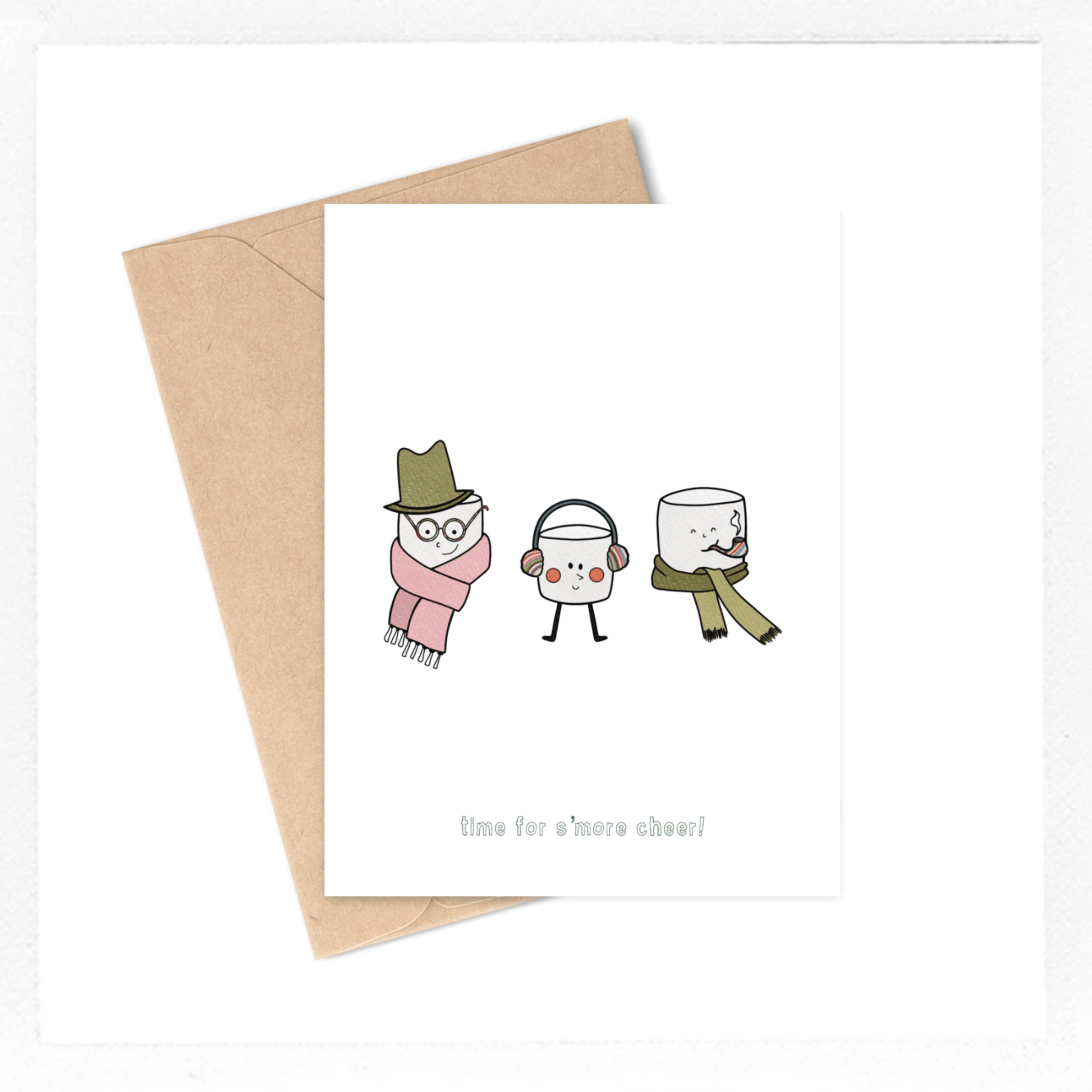 This card features a drawing of 3 cozy marshmallows, all bundled up, with the text 'time for s'more cheer!" 