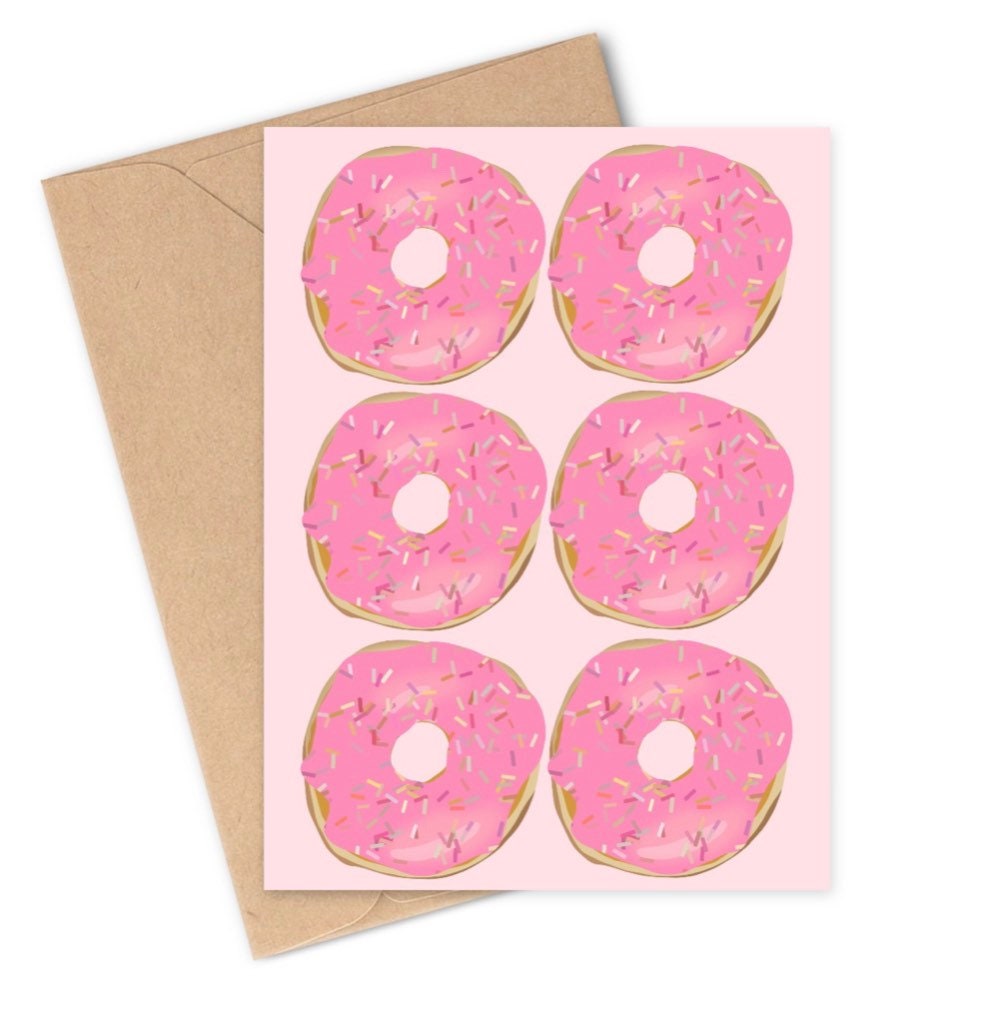 greeting card for any occasion with 6 pink, sprinkled donuts and a light pink background. There is no text on the card so it's great for any occasion